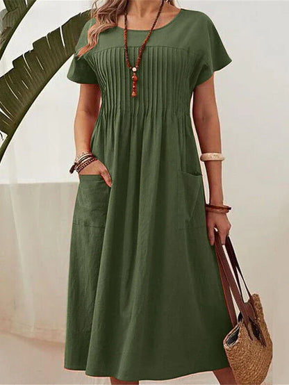dorien-pleated-midi-dress-03.webp