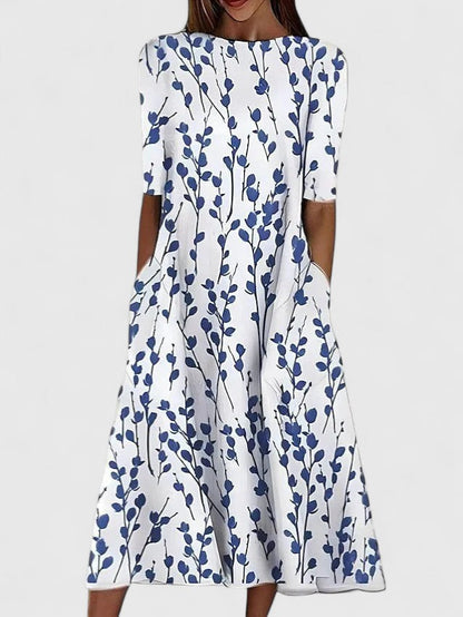karelieth-sophisticated-midi-dress-01.webp