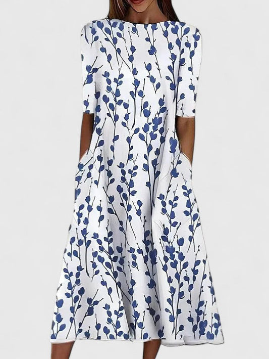 karelieth-sophisticated-midi-dress-01.webp
